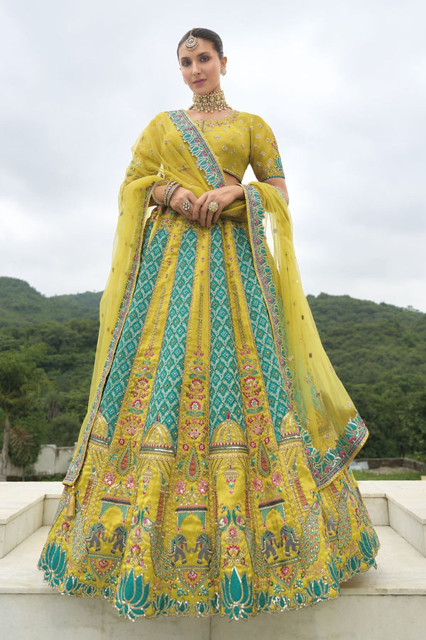 Teal Yellow Kanjivaram Lehenga Set with Net Dupatta